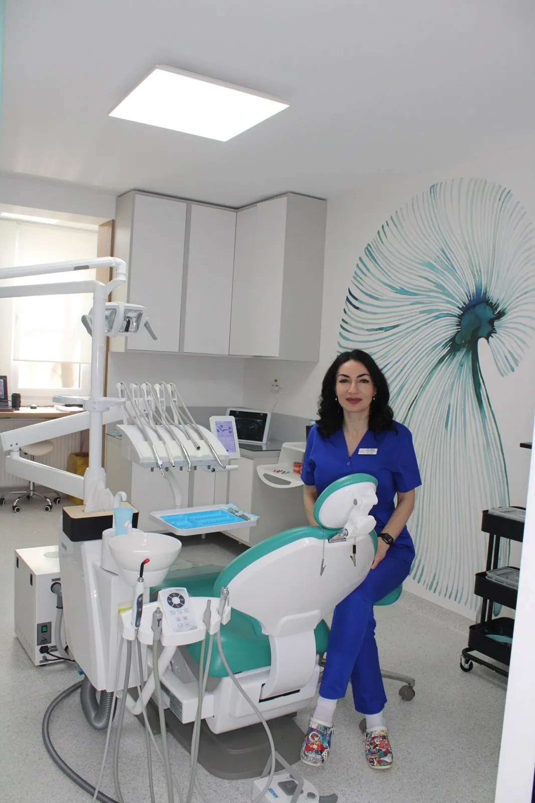 Echipă stomatologică în timpul unui tratament